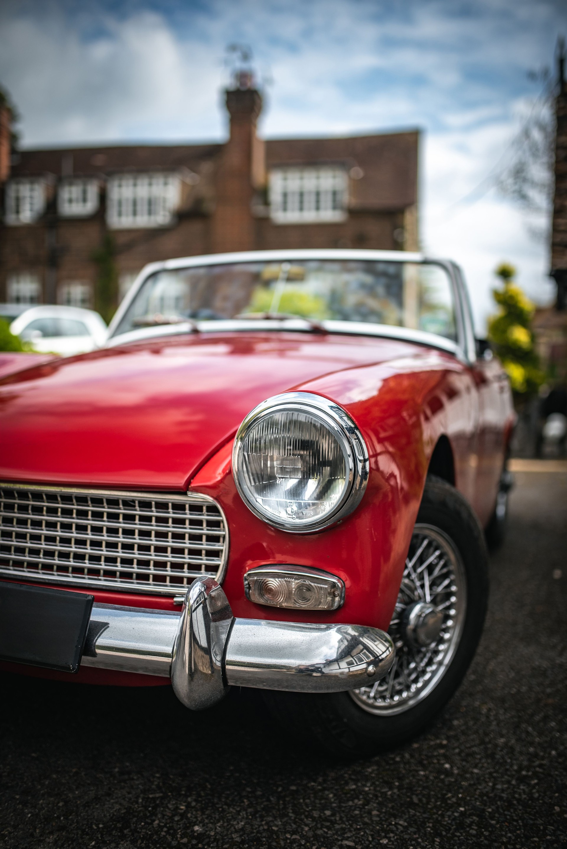 Old sports car in small village of Cuckfield in West Sussex, UK